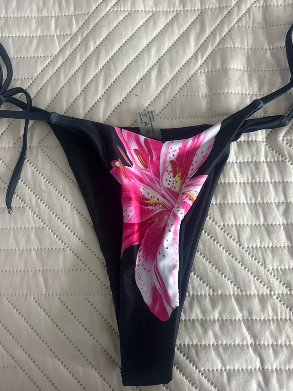 Black Bikini Top with Pink Floral Accent